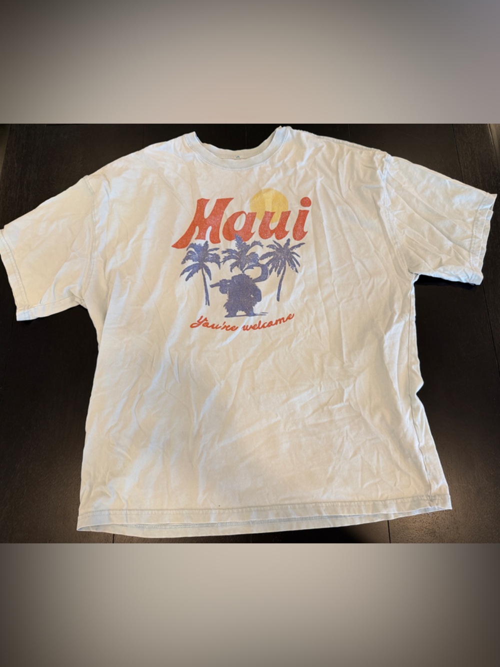 Disney White Maui Graphic Tee with Orange and Blue Print